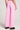 Back view of a woman wearing the Saltwater Luxe Petunia Pull-On Pant on a neutral background