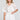 Front view of a woman wearing the Saltwater Luxe Zerra Top on a neutral background