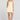 Front view of a woman wearing the Saltwater Luxe  Zurina Mini Dress in Sunglow on a neutral background